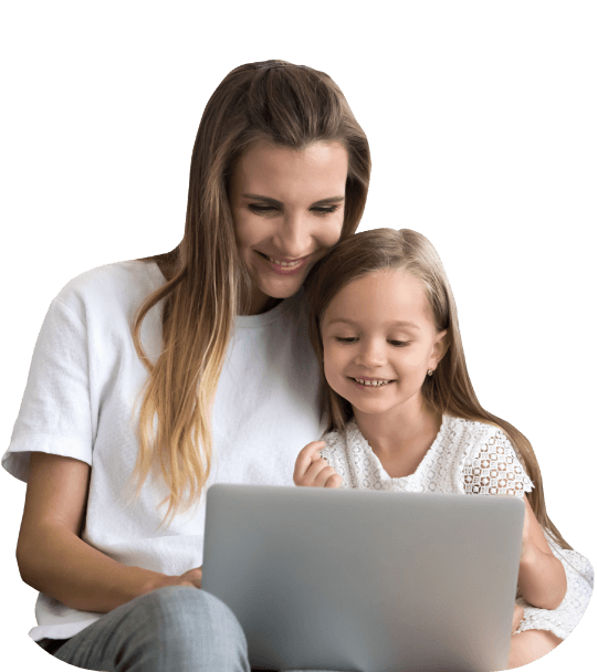 girl with mother looking at a laptop