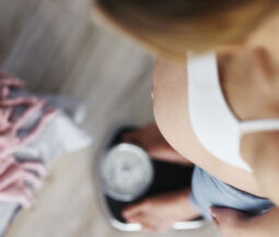 pregnant woman on the scale