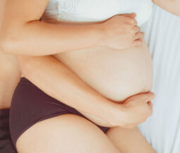 intimate moment couple pregnancy