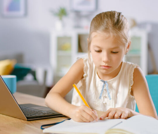 little girl studying home