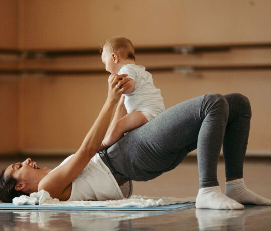 mom exersice with baby