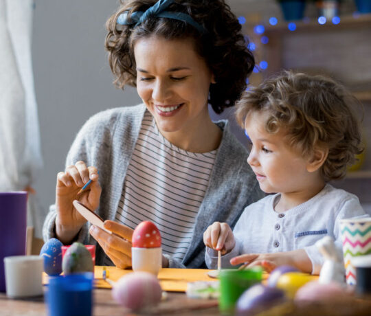 mom and kid making easter stuff