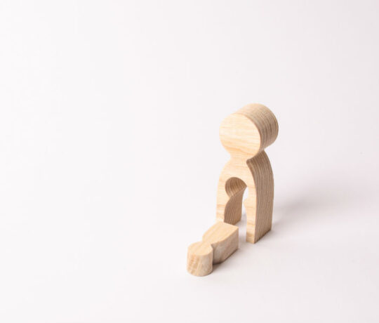 wooden dall showing miscarriage metaphor