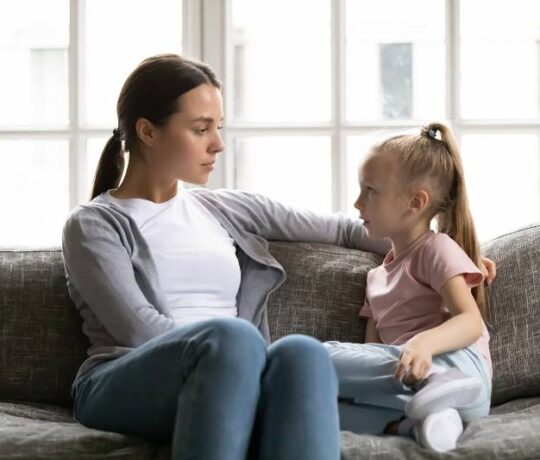 mom talks to little daughter