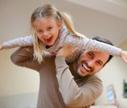 dad and daughter playing