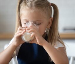 little girl drinking milk