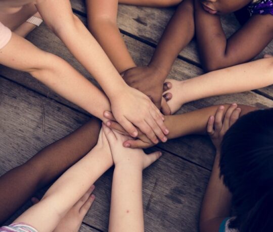 friends holding hands