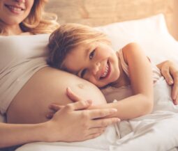 pregnant woman with daughter