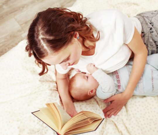 woman breastfeeds her baby