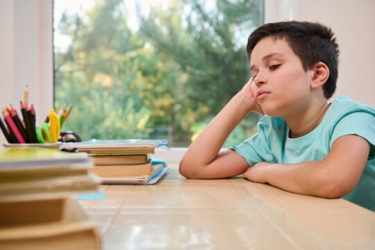 kid having difficulties with reading