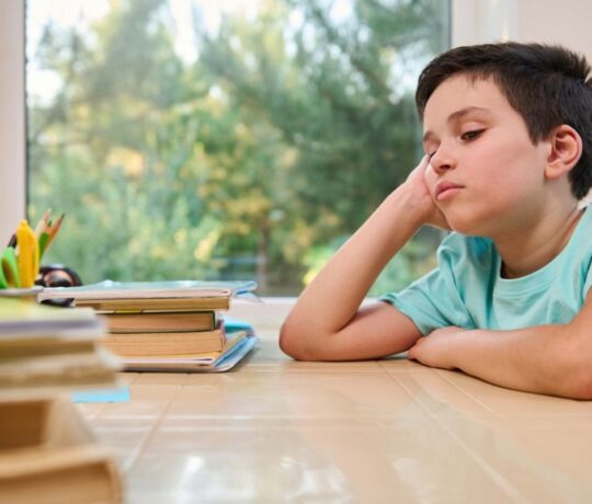 kid having difficulties with reading