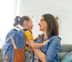 mom with daughter going to school
