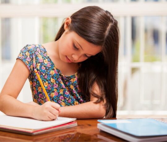 little girl studying