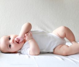 baby with hand in mouth